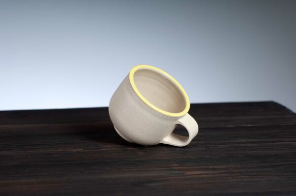 top view of espresso cup with yellow rim