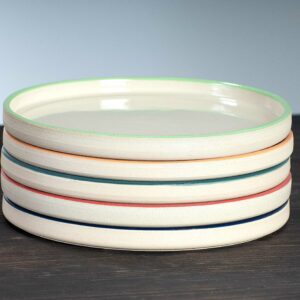 stacked selection of side plates in range of colours